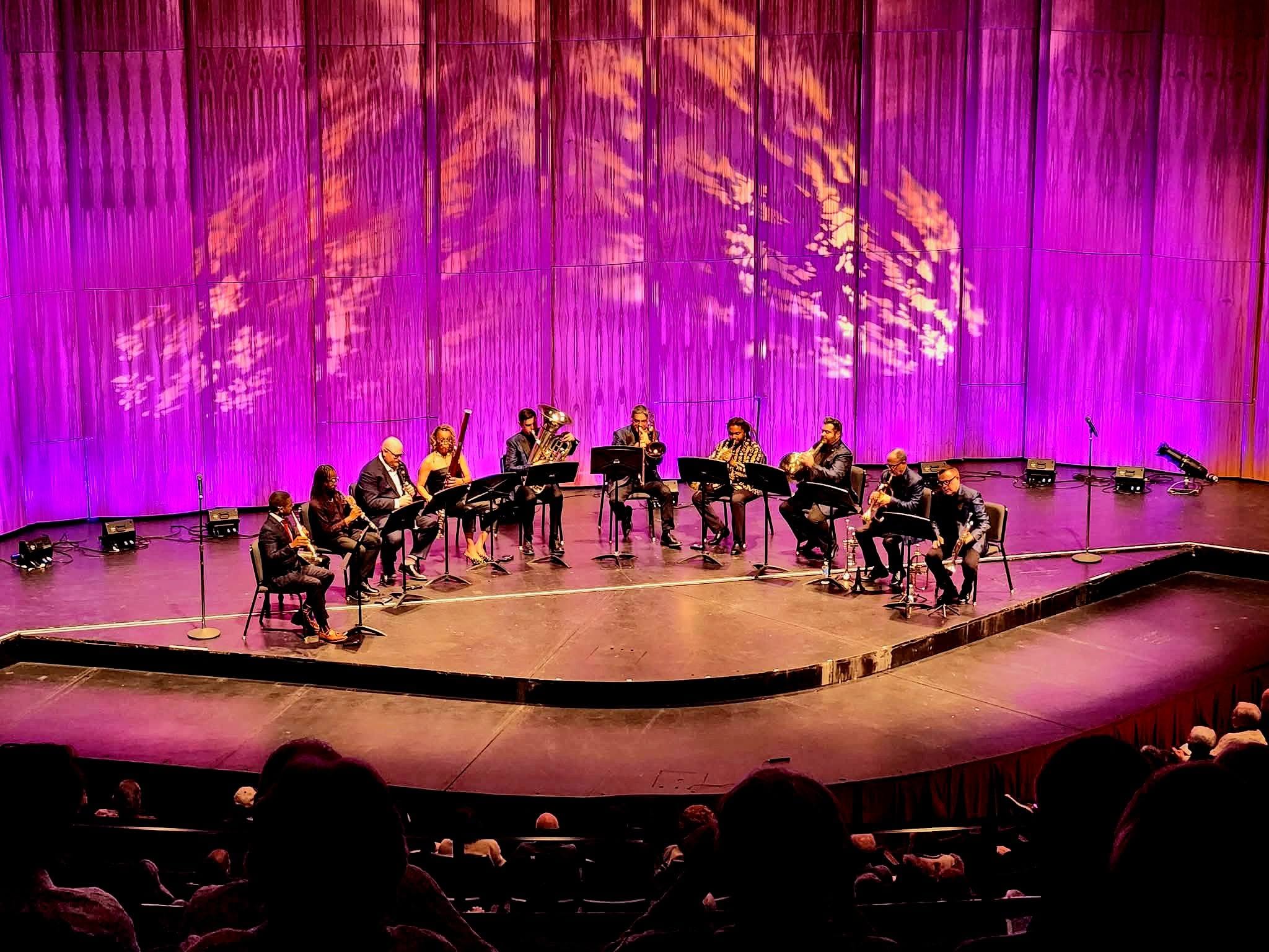 Chris Castellanos performing with a chamber ensemble onstage